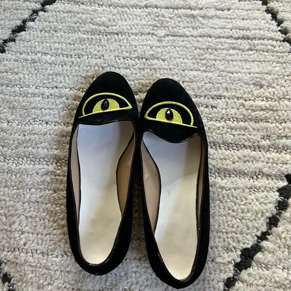 Charlotte Olympia Black Flats with Yellow Eye Design